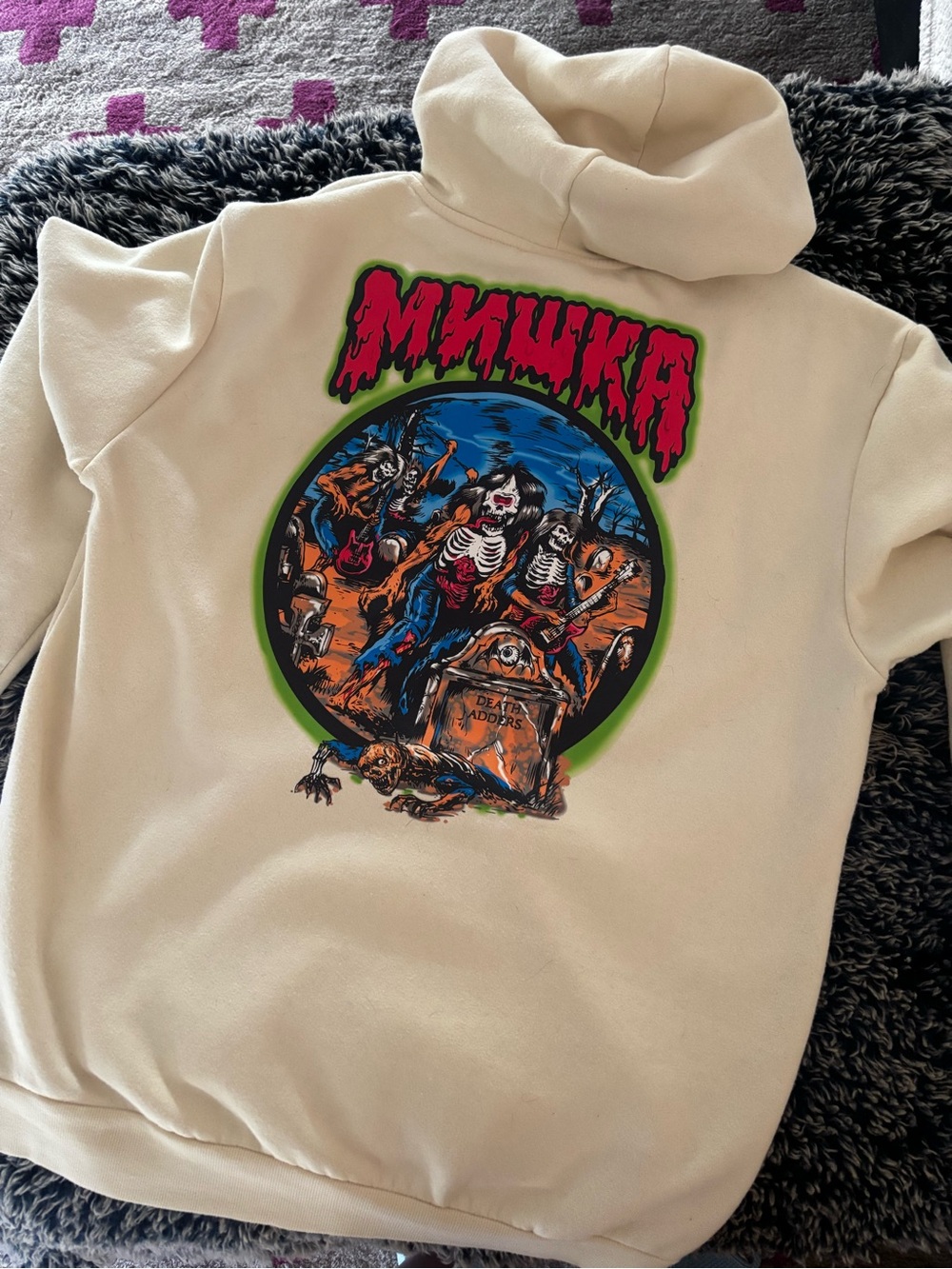 Mishka Graphic Hoodie in Cream with Neon Skull Design
